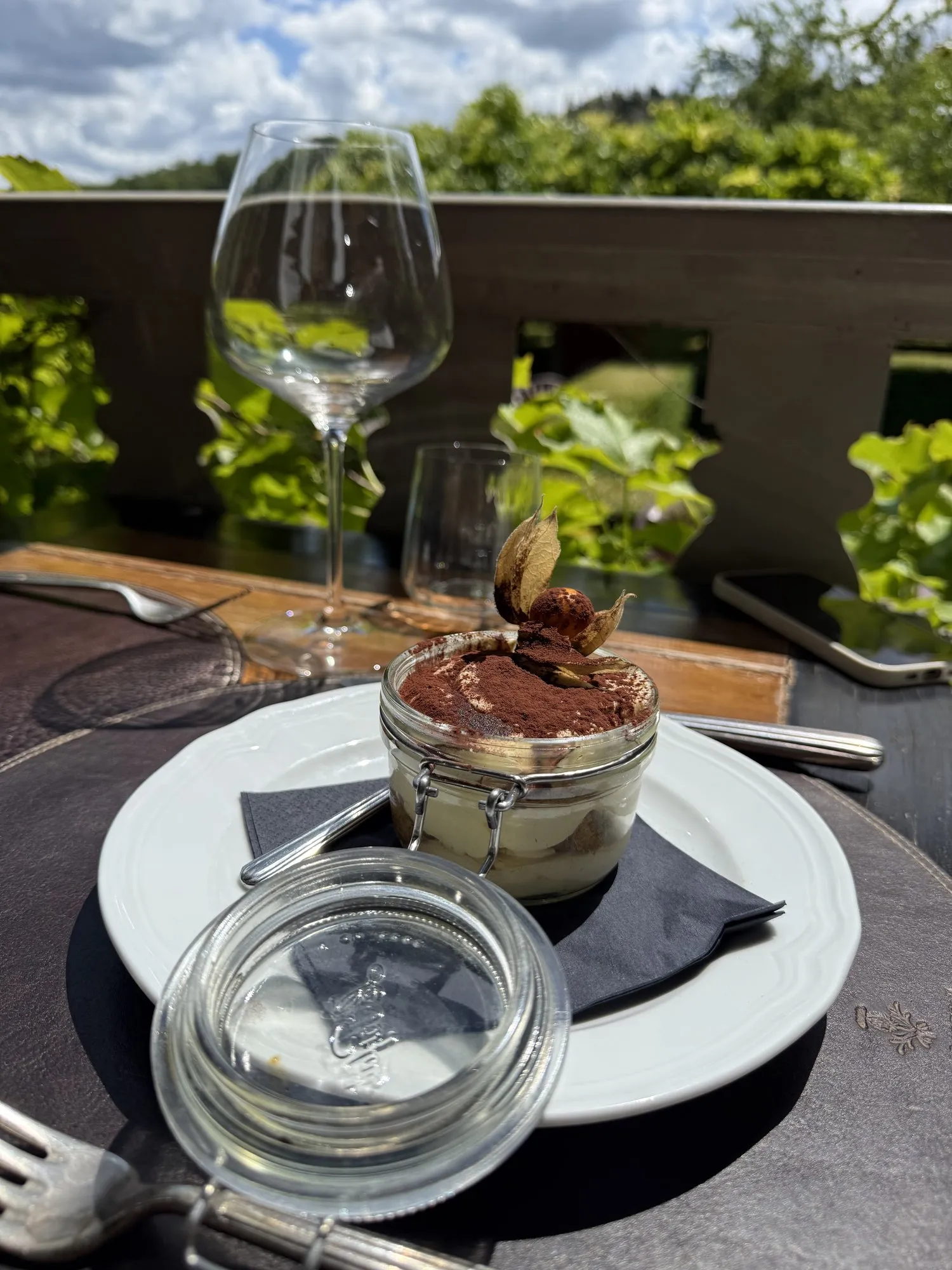 A long terrace lunch in Chianti with vineyards beyond